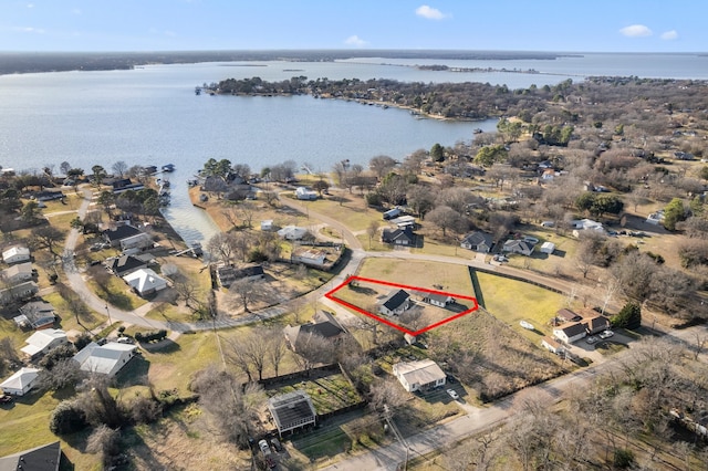 drone / aerial view with a water view