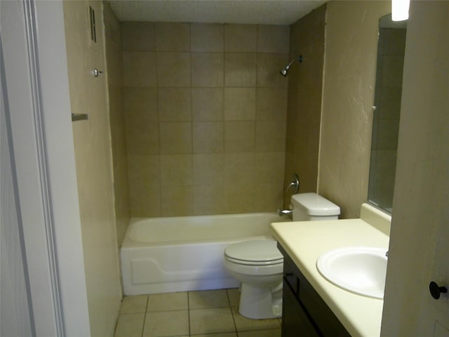 full bath featuring washtub / shower combination, vanity, toilet, and tile patterned floors