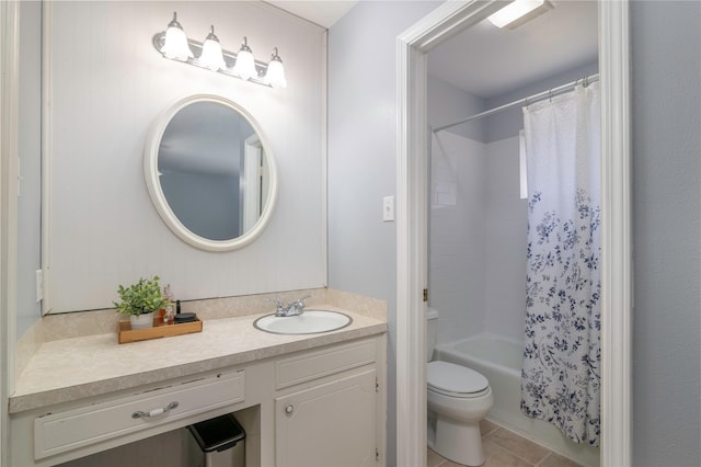 full bath featuring toilet, tile patterned floors, shower / bath combination with curtain, and vanity