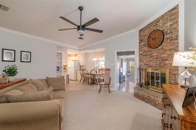 living area with carpet floors, vaulted ceiling, a fireplace, and crown molding