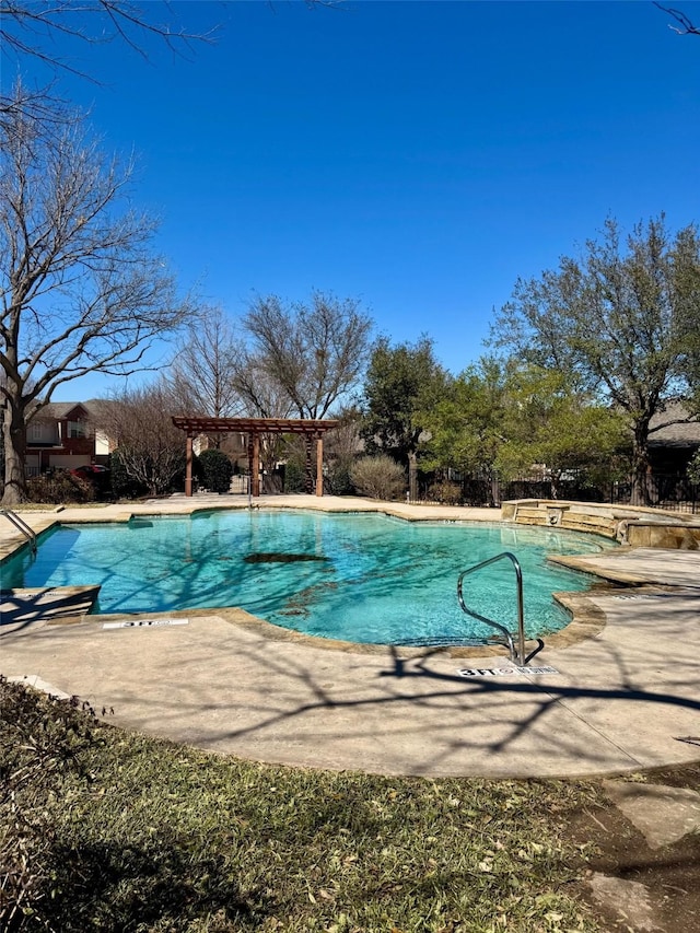 community pool featuring a patio and a pergola