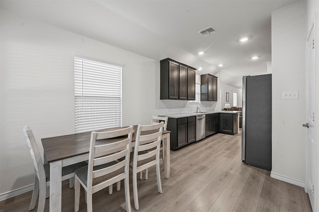 kitchen featuring light wood-style flooring, recessed lighting, visible vents, baseboards, and appliances with stainless steel finishes