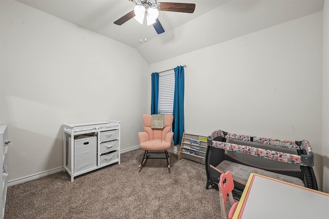 carpeted bedroom with vaulted ceiling, baseboards, and ceiling fan