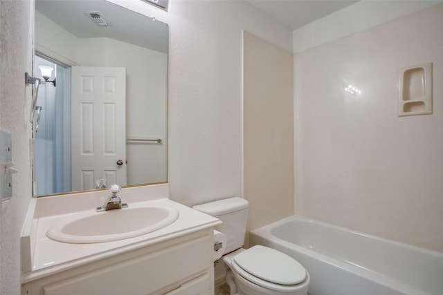 bathroom with visible vents, shower / tub combination, vanity, and toilet