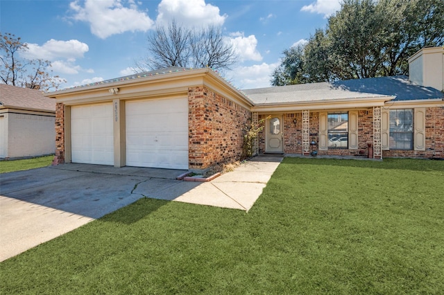 ranch-style home featuring concrete driveway, brick siding, a chimney, and a front lawn