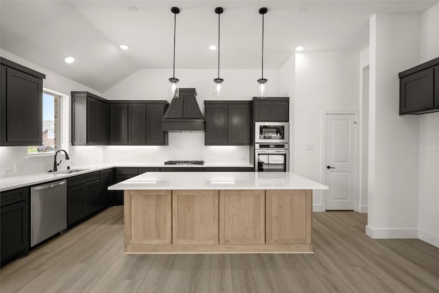 317 Willie Way, Burleson, TX 76028 - kitchen with appliances with stainless steel finishes, custom exhaust hood, a sink, light wood-type flooring, and tasteful backsplash