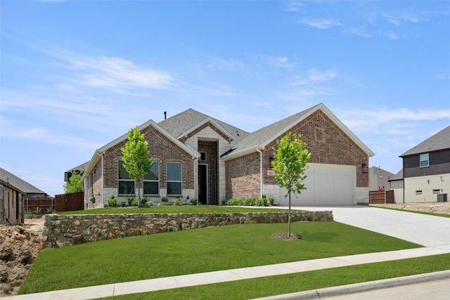 317 Willie Way, Burleson, TX 76028 - view of front facade with brick siding, driveway, a garage, and stone siding
