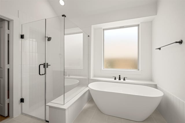 317 Willie Way, Burleson, TX 76028 - full bath featuring a freestanding tub, a stall shower, and tile patterned floors