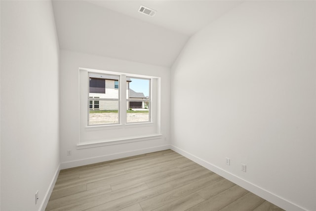 317 Willie Way, Burleson, TX 76028 - unfurnished room featuring light wood-type flooring, baseboards, and lofted ceiling