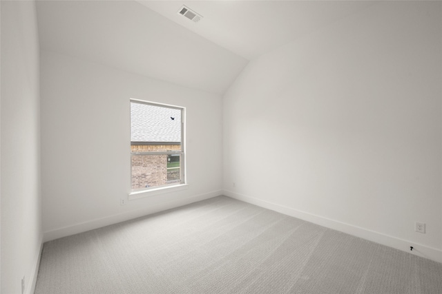 317 Willie Way, Burleson, TX 76028 - empty room featuring light carpet, baseboards, and lofted ceiling