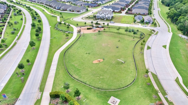 birds eye view of property with a residential view