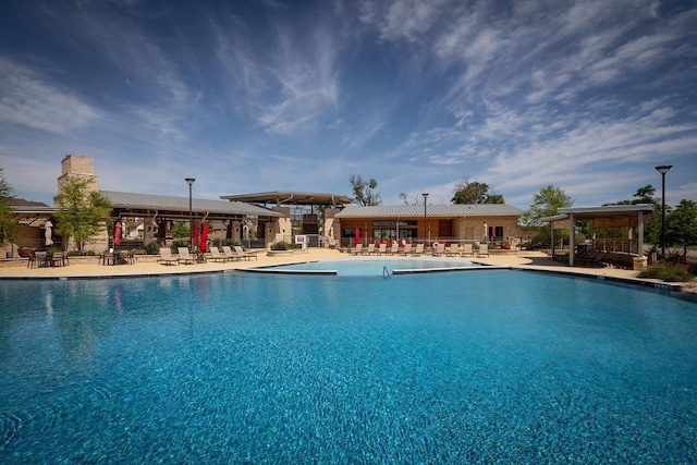 pool featuring a patio area