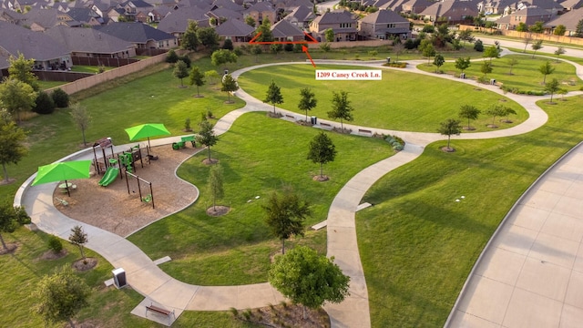 birds eye view of property with a residential view