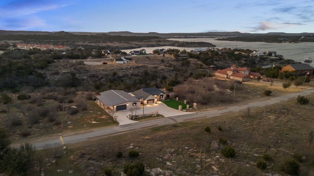 birds eye view of property featuring a mountain view