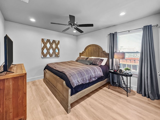 bedroom featuring recessed lighting, baseboards, ceiling fan, and light wood finished floors