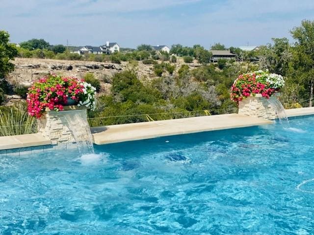 view of pool featuring a fenced in pool