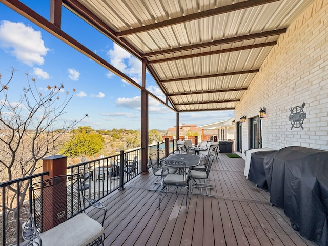 deck featuring outdoor dining area