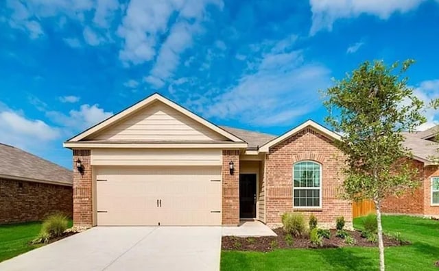 ranch-style home with driveway, brick siding, an attached garage, and a front yard