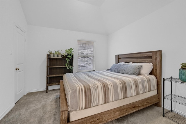 bedroom featuring baseboards and carpet floors