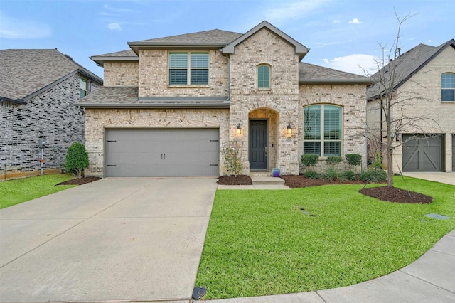 french country inspired facade featuring brick siding, a front yard, and a shingled roof