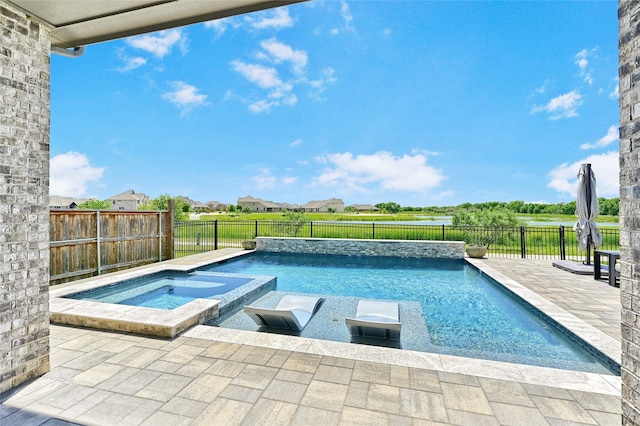 782 Corner Post Path, Celina, TX 75009 - view of swimming pool featuring a pool with connected hot tub, a fenced backyard, and a patio area