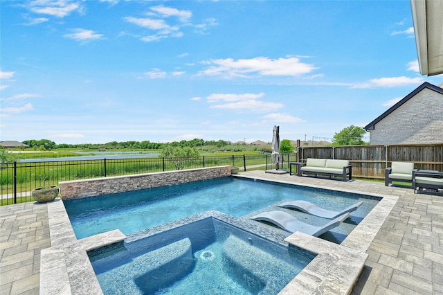 782 Corner Post Path, Celina, TX 75009 - view of pool with a water view, a patio area, a fenced backyard, a pool with connected hot tub, and an outdoor hangout area