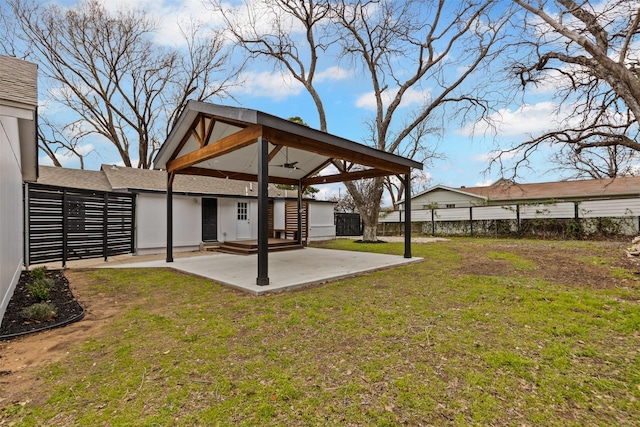 view of yard with a gazebo, a patio area, and fence private yard