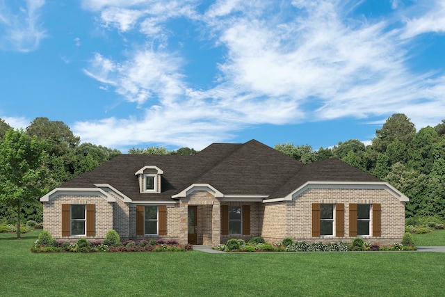 view of front facade with a front yard, brick siding, and roof with shingles