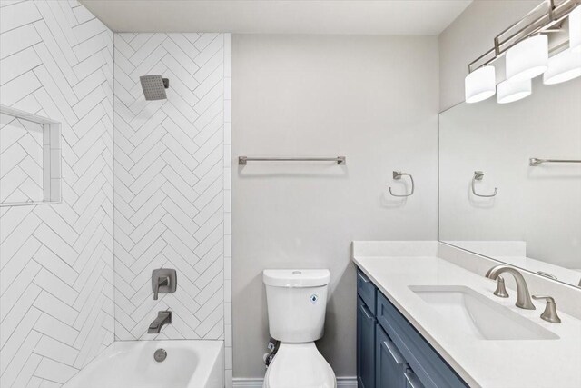 full bathroom featuring toilet,  shower combination, and vanity