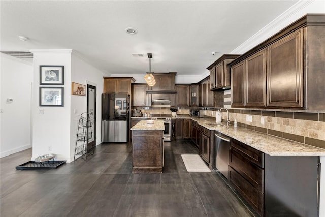 kitchen with light stone counters, ornamental molding, a sink, stainless steel appliances, and backsplash