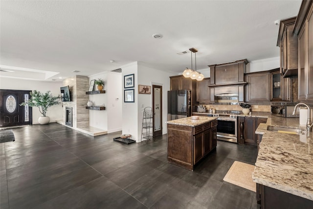 kitchen featuring stainless steel range with electric cooktop, a sink, smart refrigerator, and dark brown cabinets