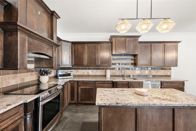 kitchen featuring stainless steel appliances, ornamental molding, backsplash, and a sink