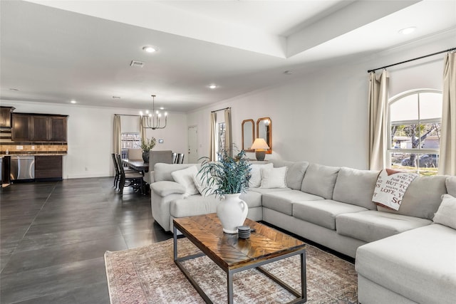 living room featuring visible vents, a chandelier, ornamental molding, and recessed lighting