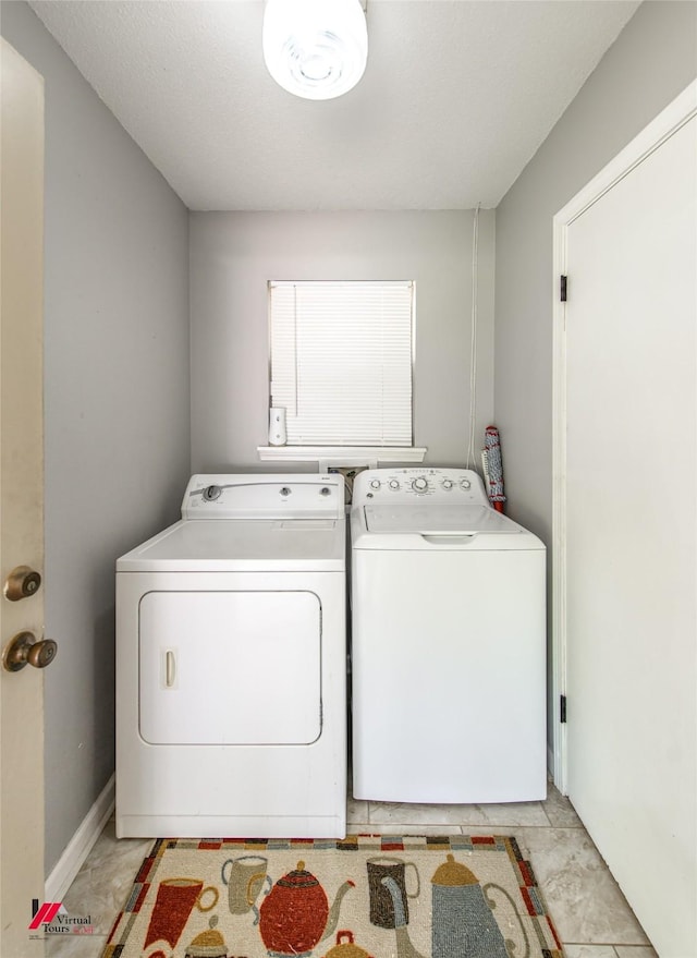 laundry area featuring washer and dryer and laundry area