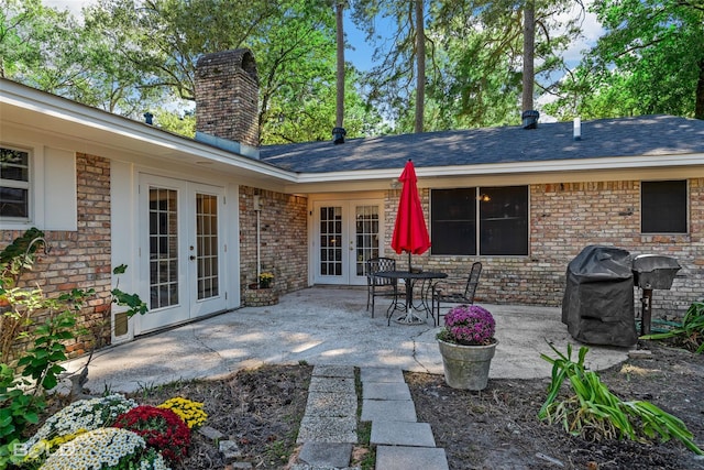 view of patio / terrace featuring french doors and grilling area