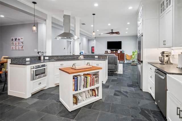 154 Bayside Cir, Malakoff, TX 75148 - kitchen with stainless steel appliances, ventilation hood, ceiling fan, white cabinetry, and open floor plan