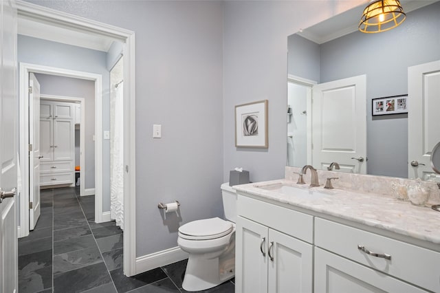 154 Bayside Cir, Malakoff, TX 75148 - bathroom with ornamental molding, toilet, baseboards, and vanity