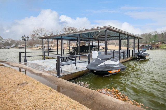 dock area featuring a water view