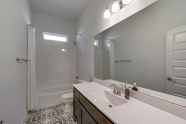 bathroom featuring tile patterned flooring, vanity, toilet, and shower / bath combo with shower curtain