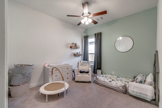 bedroom with ceiling fan, carpet, visible vents, and baseboards