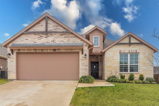 view of front of property featuring brick siding, an attached garage, central AC unit, a front yard, and driveway