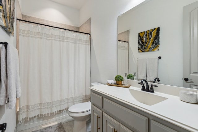 bathroom with toilet, a shower with shower curtain, and vanity