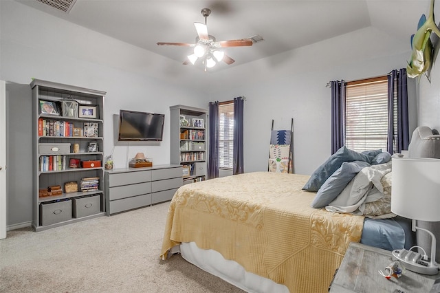 bedroom with a ceiling fan, visible vents, and carpet flooring