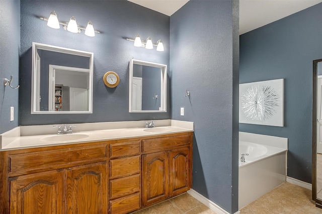 bathroom featuring double vanity, a garden tub, a sink, and tile patterned floors