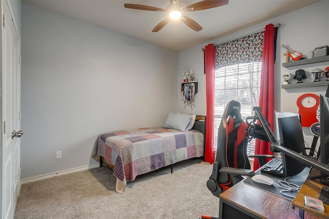 bedroom featuring ceiling fan, carpet, and baseboards