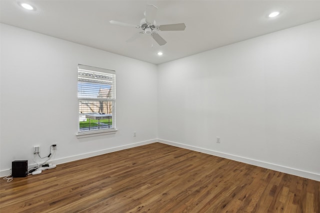 unfurnished room with a ceiling fan, baseboards, wood finished floors, and recessed lighting