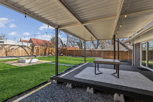 view of patio / terrace with a fenced backyard and a wooden deck