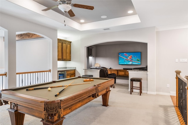 playroom with light carpet, visible vents, a tray ceiling, and recessed lighting