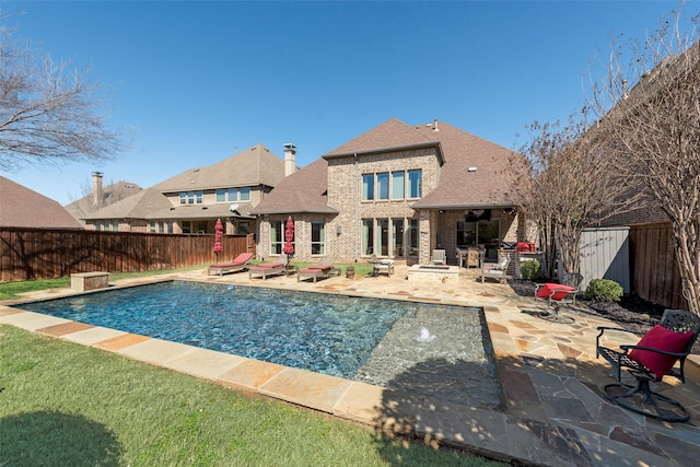 view of pool featuring a fenced in pool, a patio area, and a fenced backyard