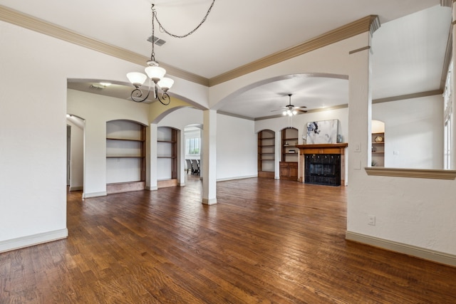 5805 Parker Village Dr, Parker, TX 75002 - unfurnished living room with a tile fireplace, built in features, arched walkways, a ceiling fan, and baseboards
